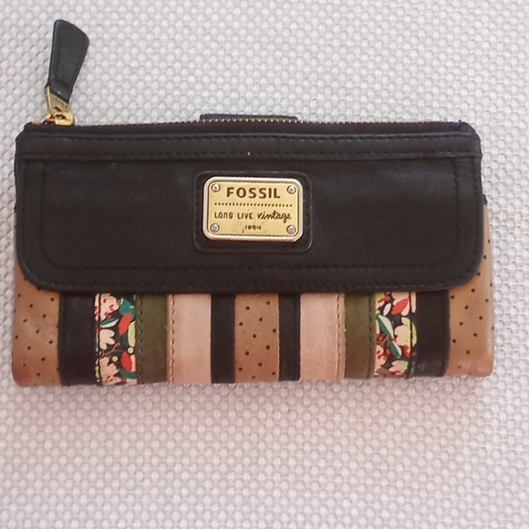 Fossil Handbags - Fossil wallet. 7.5 inches by 4.25 inches.